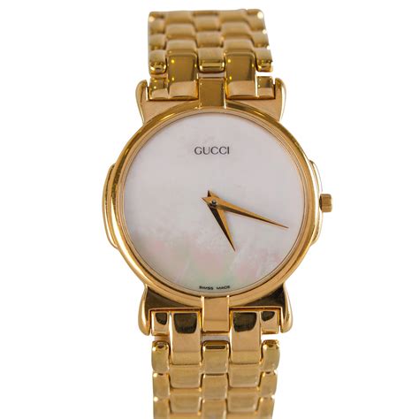 original gucci gold tone mother of pearl watch|gucci watch interchangeable faces.